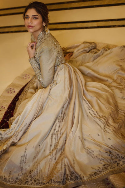 A TOOSH SILK DUPION EMBROIDERED  ANGARAKHA STYLED WITH TOOSH QUILTED AND EMBROIDERED CHANDERI SKIRT (MH-03)