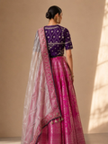 FUCHSIA PINK BANARASI LEHENGA PAIRED WITH A PURPLE EMBROIDERED BLOUSE AND MUSTARD YELLOW EMBROIDERED DUPATTA. (4PCS)