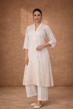 IVORY CHANDERI KURTA WITH PINK FLORAL EMBROIDERY AND SCALLOPED EDGES