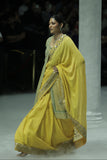 MUSTARD EMBROIDERED SAREE PAIRED WITH A MINT GREEN EMBROIDERED TISSUE JACKET. (4 PCS)