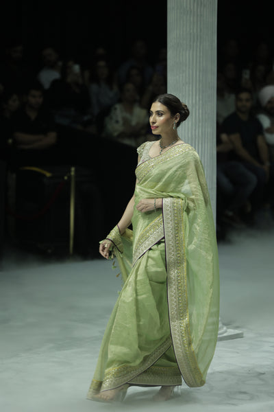 SAGE GREEN TISSUE SAREE PAIRED WITH AN EMBROIDERED BLOUSE. (2 PCS)