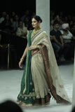 TOOSH TISSUE SAREE PAIRED WITH A GREEN DUPION EMBROIDERED LEHENGA AND MUSTARD EMBROIDERED JACKET. (4 PCS)