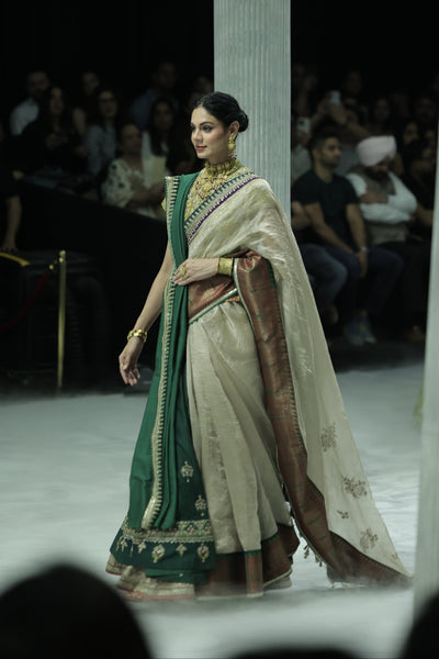 TOOSH TISSUE SAREE PAIRED WITH A GREEN DUPION EMBROIDERED LEHENGA AND MUSTARD EMBROIDERED JACKET. (4 PCS)