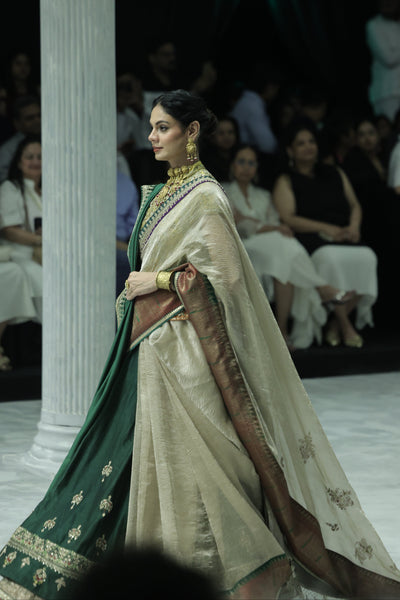 TOOSH TISSUE SAREE PAIRED WITH A GREEN DUPION EMBROIDERED LEHENGA AND MUSTARD EMBROIDERED JACKET. (4 PCS)