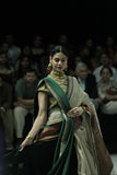 TOOSH TISSUE SAREE PAIRED WITH A GREEN DUPION EMBROIDERED LEHENGA AND MUSTARD EMBROIDERED JACKET. (4 PCS)