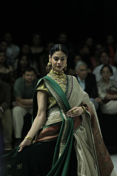 TOOSH TISSUE SAREE PAIRED WITH A GREEN DUPION EMBROIDERED LEHENGA AND MUSTARD EMBROIDERED JACKET. (4 PCS)