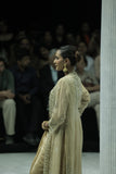 DARK GOLD CRINKLE TISSUE EMBROIDERED SAREE PAIRED WITH A NUDE BUSTIER, GOLD KOTA TISSUE SCALLOP EMBROIDERED JACKET, AND GREEN VELVET EMBROIDERED KOTI. (5 PCS)