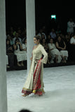 TOOSH EMBROIDERED MATIN TUSSAR ANGRAKHA PAIRED WITH A CHURIDAR AND RED EMBROIDERED TUSSAR DUPATTA.(3 PCS)