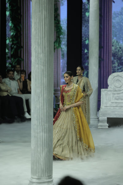 TISSUE EMBROIDERED LEHENGA PAIRED WITH AN EMBROIDERED BLOUSE, EMBELLISHED KOTI, AND DUAL DUPATTAS IN YELLOW TULLE AND RED EMBROIDERY.(5 PCS)