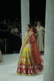 RADHA MULTICOLOUR LEHENGA PAIRED WITH A TOOSH BLOUSE, HEAVY TOOSH EMBROIDERED DUPATTA, ORANGE EMBROIDERED VEIL, AND RED NET EMBROIDERED DUPATTA. (5 PCS)