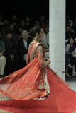 RED TULLE HEAVY EMBROIDERED ANARKALI PAIRED WITH A NUDE BUSTIER, RED BROCADE EMBROIDERED LEHENGA, AND RED TULLE EMBROIDERED DUPATTA. (4 PCS)