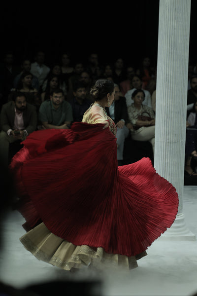 RED CRINKLED EMBROIDERED ANARKALI PAIRED WITH A GOLD TISSUE EMB SKIRT AND GOLD DUPATTA. (3 PCS)