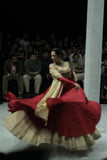 RED CRINKLED EMBROIDERED ANARKALI PAIRED WITH A GOLD TISSUE EMB SKIRT AND GOLD DUPATTA. (3 PCS)