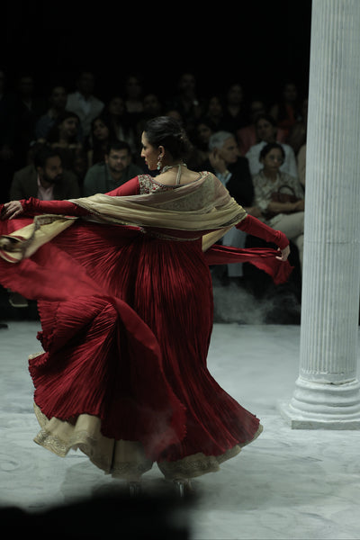RED CRINKLED EMBROIDERED ANARKALI PAIRED WITH A GOLD TISSUE EMB SKIRT AND GOLD DUPATTA. (3 PCS)