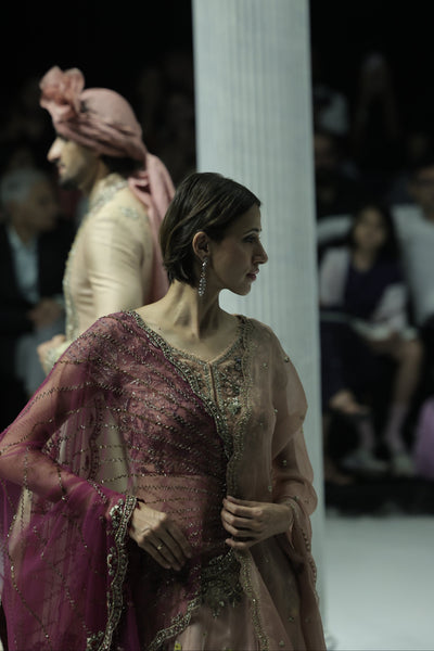 OLD ROSE NET AND ORGANZA EMBROIDERED LEHENGA SET PAIRED WITH A DELICATE FALSA EMBROIDERED DUPATTA. (4PCS)