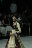 GOLD TISSUE CRUSHED ANARKALI PAIRED WITH A GREEN EMBROIDERED KOTI, SHARARA, AND PURPLE ANTIQUE EMBROIDERED DUPATTA. (4 PCS)