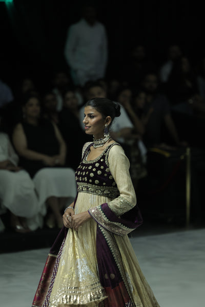 GOLD TISSUE CRUSHED ANARKALI PAIRED WITH A GREEN EMBROIDERED KOTI, SHARARA, AND PURPLE ANTIQUE EMBROIDERED DUPATTA. (4 PCS)