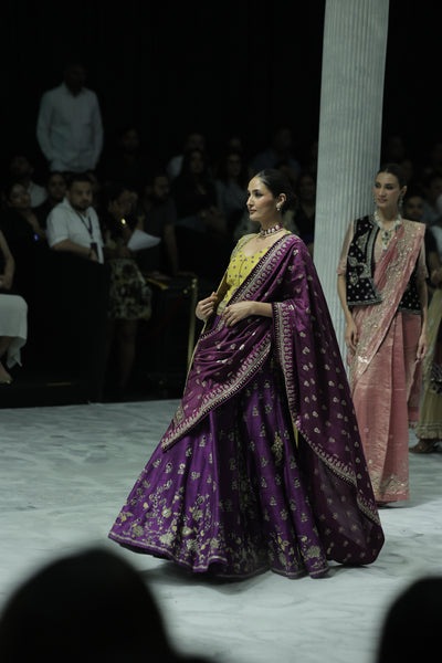 PURPLE EMBROIDERED LEHENGA PAIRED WITH A YELLOW EMBROIDERED BLOUSE AND MUSTARD  & PURPLE TWO EMBROIDERED DUPATTA.(4PCS)