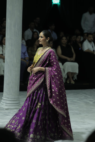 PURPLE EMBROIDERED LEHENGA PAIRED WITH A YELLOW EMBROIDERED BLOUSE AND MUSTARD  & PURPLE TWO EMBROIDERED DUPATTA.(4PCS)