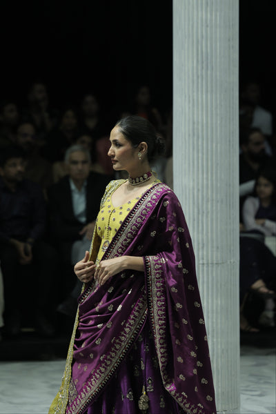 PURPLE EMBROIDERED LEHENGA PAIRED WITH A YELLOW EMBROIDERED BLOUSE AND MUSTARD  & PURPLE TWO EMBROIDERED DUPATTA.(4PCS)