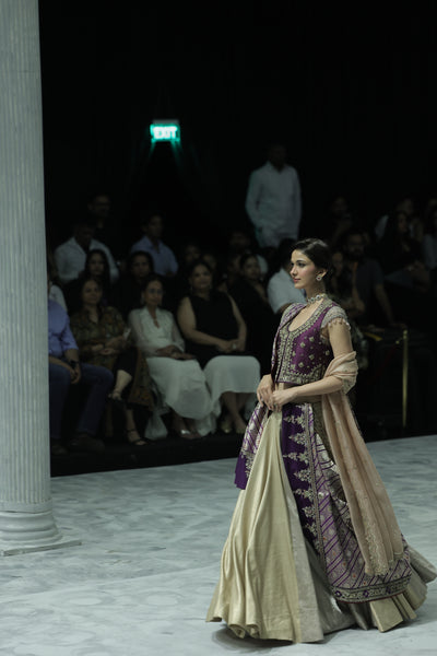 SILVER AND GOLD TISSUE SKIRT PAIRED WITH A PURPLE DUPION EMBROIDERED JACKET, OLD ROSE BLOUSE, BLUSH EMBROIDERED DUPATTA, AND PURPLE BROCADE EMBROIDERED DUPATTA. (5 PCS)