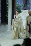 GOLD FOIL-PRINTED TISSUE SAREE PAIRED WITH A PURPLE EMBROIDERED KEDIA AND PEACH TISSUE ANTIQUE BORDER DUPATTA. (3PCS)