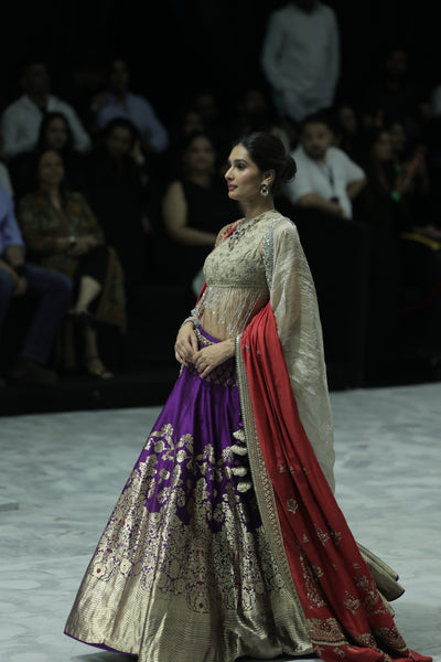 PURPLE BANARASI BROCADE LEHENGA PAIRED WITH A TOOSH EMBROIDERED BLOUSE, TOOSH EMB CRUSHED DUPATTA, AND RED EMBROIDERED DUPATTA.(4PCS)