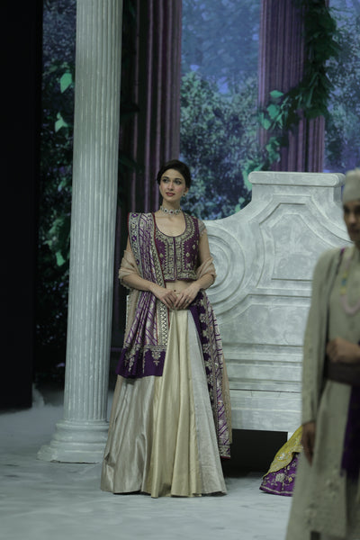 SILVER AND GOLD TISSUE SKIRT PAIRED WITH A PURPLE DUPION EMBROIDERED JACKET, OLD ROSE BLOUSE, BLUSH EMBROIDERED DUPATTA, AND PURPLE BROCADE EMBROIDERED DUPATTA. (5 PCS)