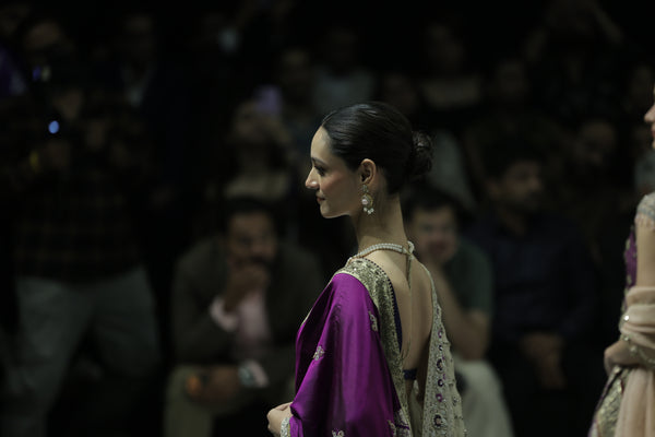 BLUE BROCADE LEHENGA PAIRED WITH A BLUE BUSTIER, PURPLE SILK DUSHALA, AND TOOSH ORGANZA EMBROIDERED DUPATTA.(4PCS)