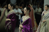 BLUE BROCADE LEHENGA PAIRED WITH A BLUE BUSTIER, PURPLE SILK DUSHALA, AND TOOSH ORGANZA EMBROIDERED DUPATTA.(4PCS)