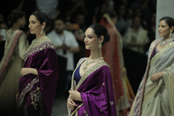 BLUE BROCADE LEHENGA PAIRED WITH A BLUE BUSTIER, PURPLE SILK DUSHALA, AND TOOSH ORGANZA EMBROIDERED DUPATTA.(4PCS)