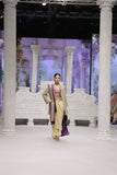 GOLD DRAPE SKIRT PAIRED WITH A RUBY EMBROIDERED KOTI, GOLD TISSUE EMBROIDERED LONG JACKET, AND PURPLE ANTIQUE DUPATTA. (4 PCS)