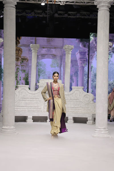 GOLD DRAPE SKIRT PAIRED WITH A RUBY EMBROIDERED KOTI, GOLD TISSUE EMBROIDERED LONG JACKET, AND PURPLE ANTIQUE DUPATTA. (4 PCS)