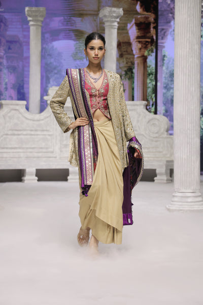 GOLD DRAPE SKIRT PAIRED WITH A RUBY EMBROIDERED KOTI, GOLD TISSUE EMBROIDERED LONG JACKET, AND PURPLE ANTIQUE DUPATTA. (4 PCS)