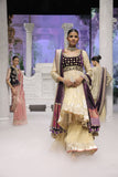 GOLD TISSUE CRUSHED ANARKALI PAIRED WITH A GREEN EMBROIDERED KOTI, SHARARA, AND PURPLE ANTIQUE EMBROIDERED DUPATTA. (4 PCS)
