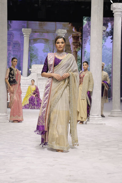 GOLD FOIL-PRINTED TISSUE SAREE PAIRED WITH A PURPLE EMBROIDERED KEDIA AND PEACH TISSUE ANTIQUE BORDER DUPATTA. (3PCS)