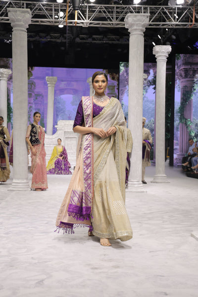 GOLD FOIL-PRINTED TISSUE SAREE PAIRED WITH A PURPLE EMBROIDERED KEDIA AND PEACH TISSUE ANTIQUE BORDER DUPATTA. (3PCS)