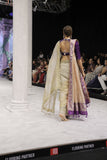 GOLD FOIL-PRINTED TISSUE SAREE PAIRED WITH A PURPLE EMBROIDERED KEDIA AND PEACH TISSUE ANTIQUE BORDER DUPATTA. (3PCS)