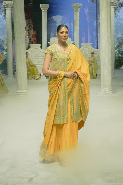 MUSTARD EMBROIDERED SAREE PAIRED WITH A MINT GREEN EMBROIDERED TISSUE JACKET. (4 PCS)