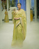 SAGE GREEN TISSUE SAREE PAIRED WITH AN EMBROIDERED BLOUSE. (2 PCS)