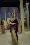 TWO-PIECE SAREE FEATURING A DEEP FALSA VELVET DUPATTA WITH TUSSAR EMBROIDERY, PAIRED WITH A TOOSH EMBROIDERED CHANDERI BLOUSE. (3PCS)