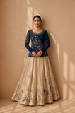 A DEEP BLUE EMBROIDERED TOP PAIRED WITH A FLOWING IVORY SKIRT.(2PCS)
