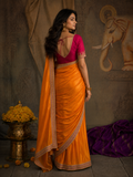 AN ORANGE SAREE MADE TO BRIGHTEN EVERY CELEBRATION. (2PCS)