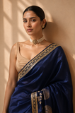 A DEEP NAVY BLUE SAREE WITH GOLD FLORAL DETAILS. (2PCS)