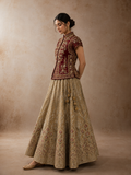 A RUBY EMBROIDERED JACKET PAIRED WITH A SOFT TOOSH LEHENGA. (2 PCS)