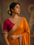 AN ORANGE SAREE MADE TO BRIGHTEN EVERY CELEBRATION. (2PCS)