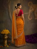 AN ORANGE SAREE MADE TO BRIGHTEN EVERY CELEBRATION. (2PCS)