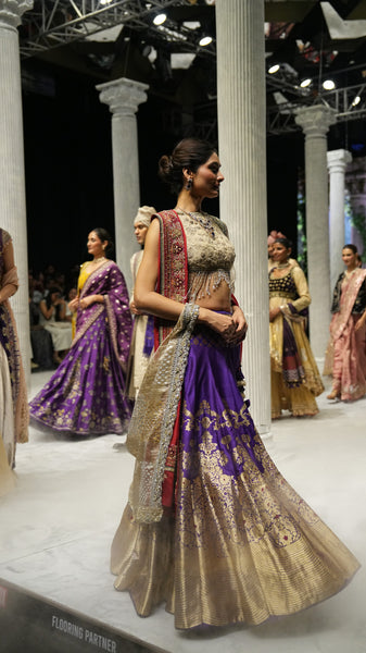 PURPLE BANARASI BROCADE LEHENGA PAIRED WITH A TOOSH EMBROIDERED BLOUSE, TOOSH EMB CRUSHED DUPATTA, AND RED EMBROIDERED DUPATTA.(4PCS)