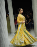 A VIBRANT PLAY OF YELLOW AND MINT, BROUGHT TO LIFE THROUGH INTRICATE EMBROIDERY. (3 PCS)