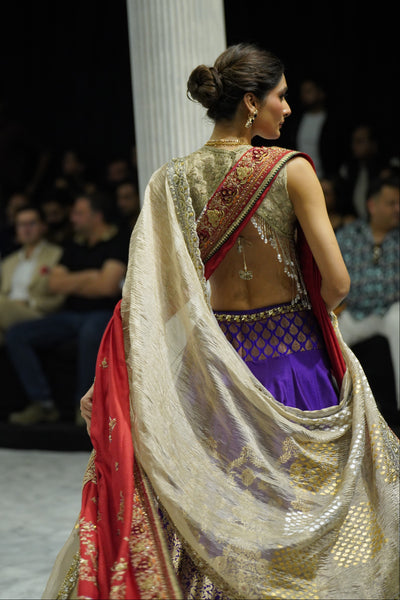 PURPLE BANARASI BROCADE LEHENGA PAIRED WITH A TOOSH EMBROIDERED BLOUSE, TOOSH EMB CRUSHED DUPATTA, AND RED EMBROIDERED DUPATTA.(4PCS)